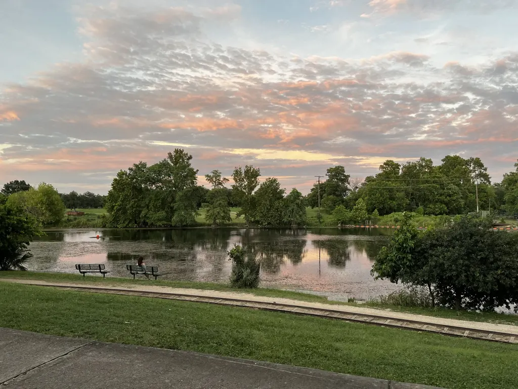 Golden-hour light over the spring-fed lake at Landa Park, New Braunfels